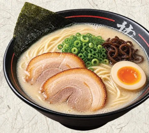 Tonkotsu ramen bowl with sliced chashu pork, soft egg, scallion and nori